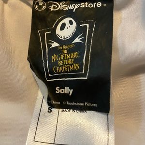 NIGHTMARE BEFORE CHRISTMAS SALLY LEGGINGS. NWOT